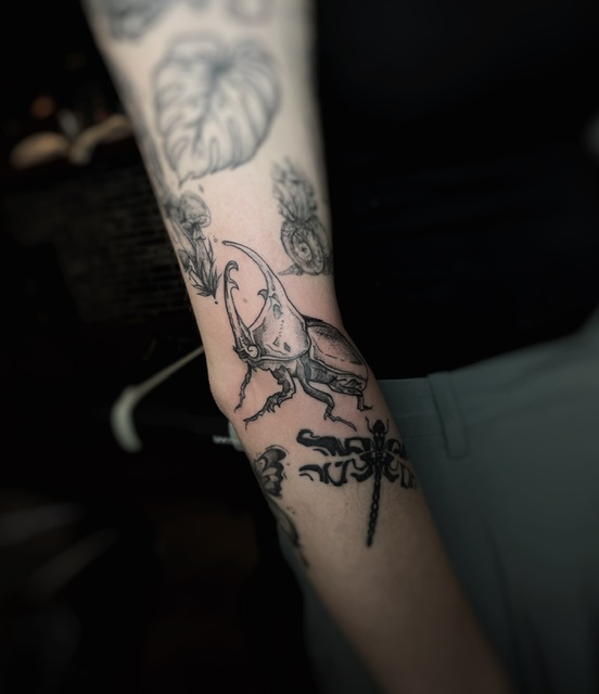 A cool rhinoceros beetle tattoo