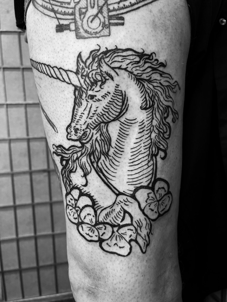 Woodcut Tattoo Unicorn with Violets